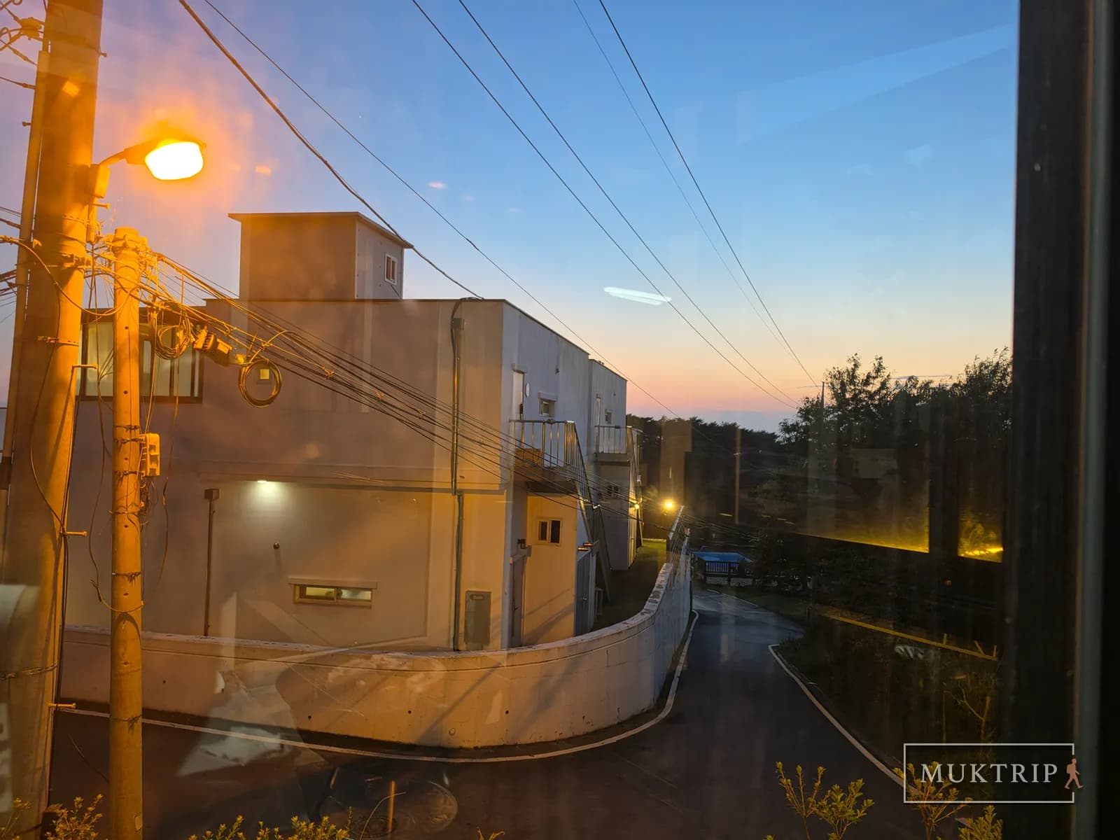 Sunset and pension seen through the window in Anmyeon-eup, Taean