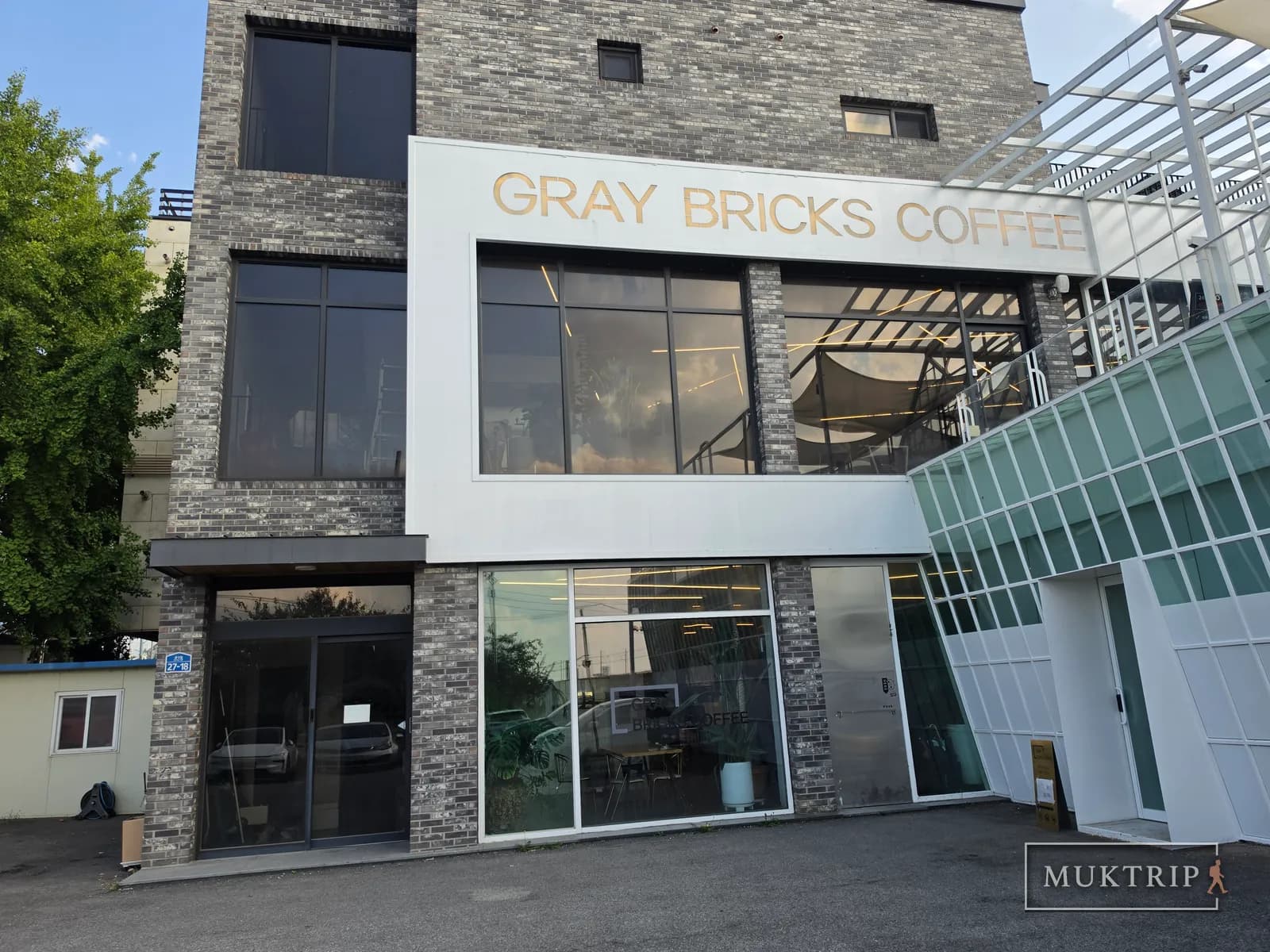 Graybricks Coffee in a gray brick building