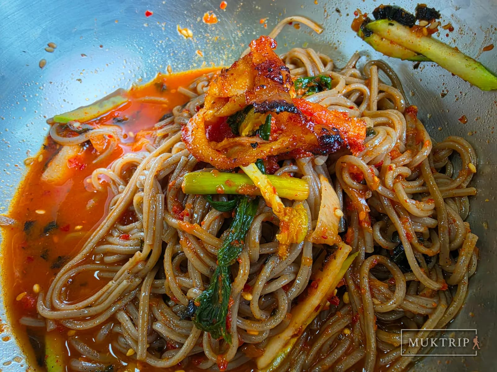 Bibim makguksu topped with meat