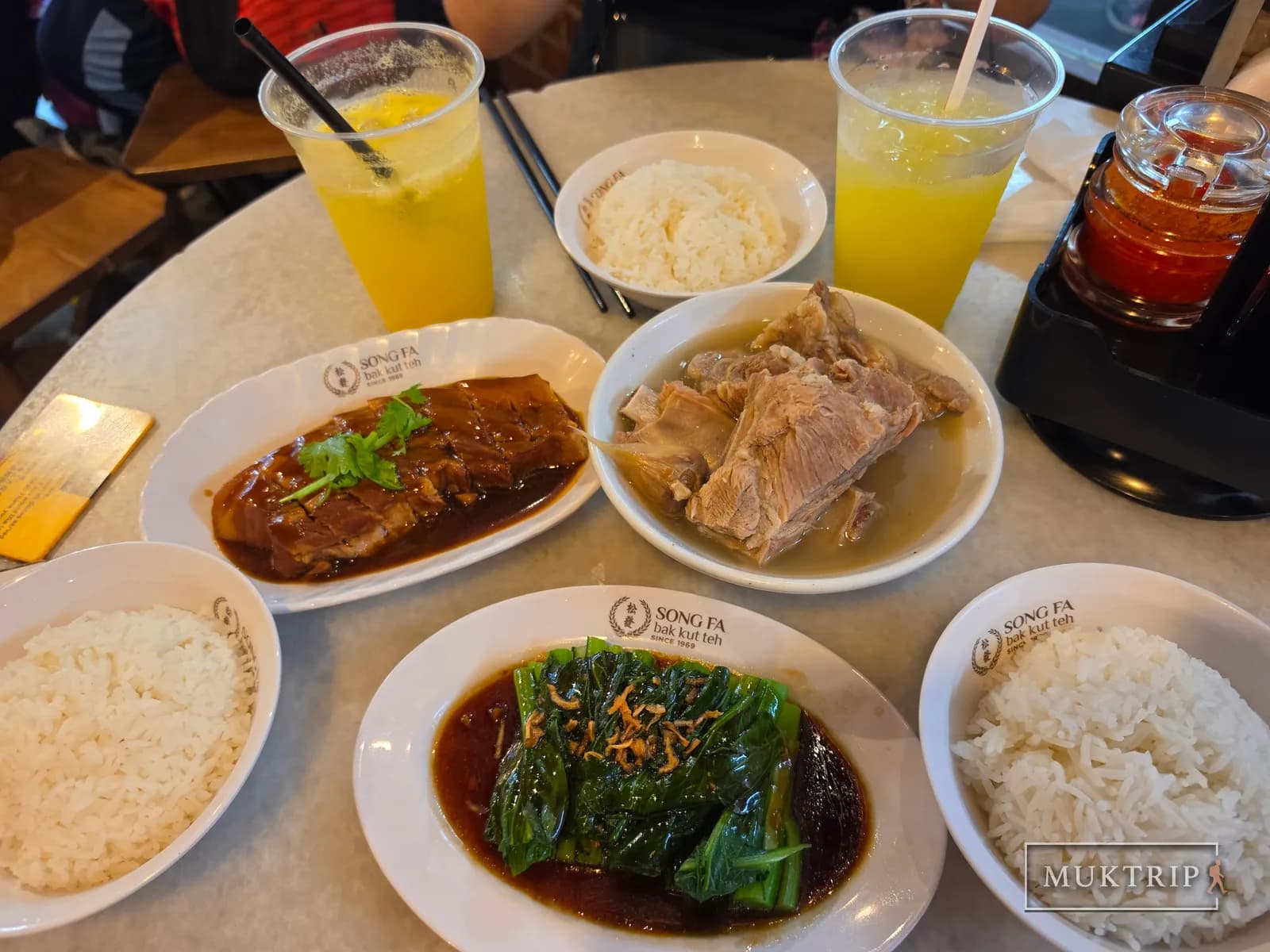 A table spread of Song Fa Bak Kut Teh for a group meal