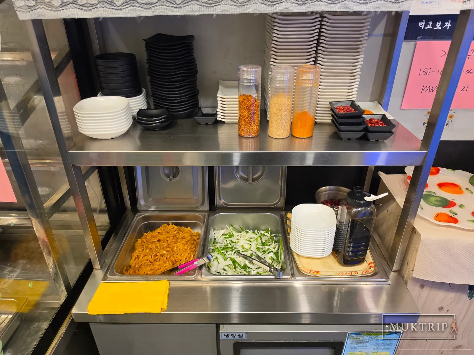 Self-service corner with sauces and side dishes